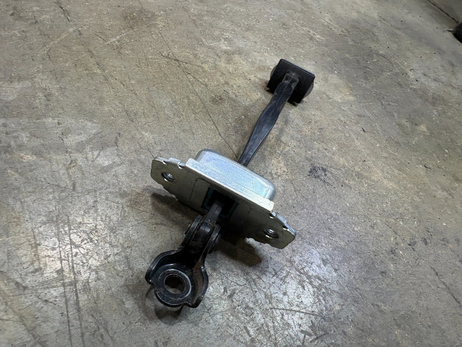2014 - 2020 NISSAN ROGUE REAR RIGHT SIDE DOOR HINGE CHECK STRAP STOPPER, OEM